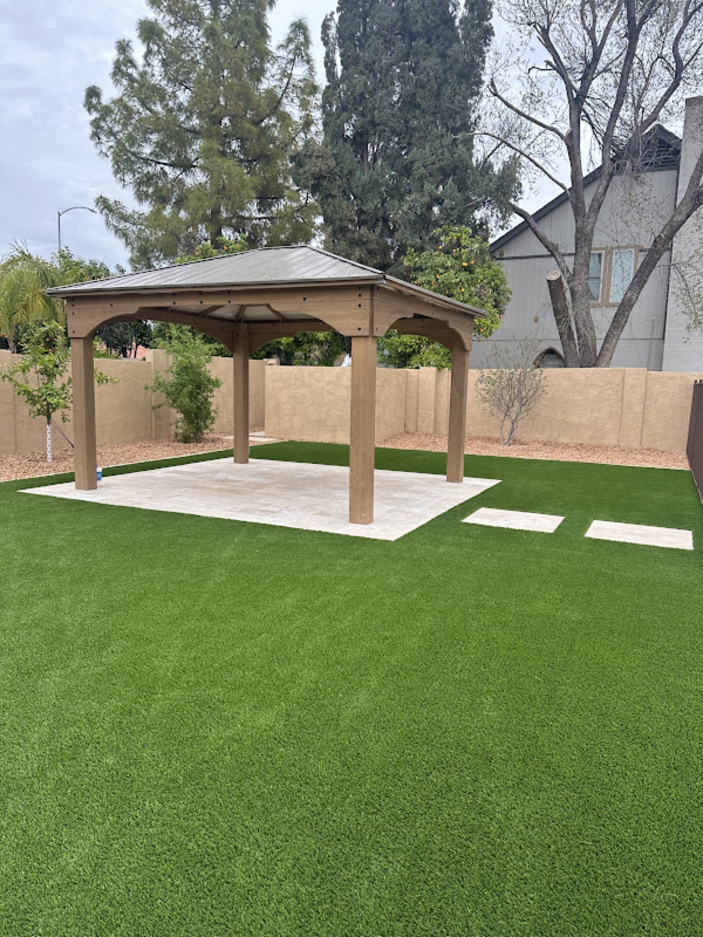 Gazebo with turf backyard