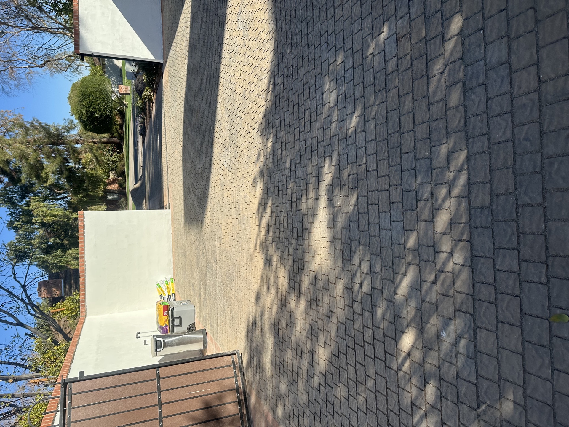 Modern paver patio with turf in a Tempe backyard