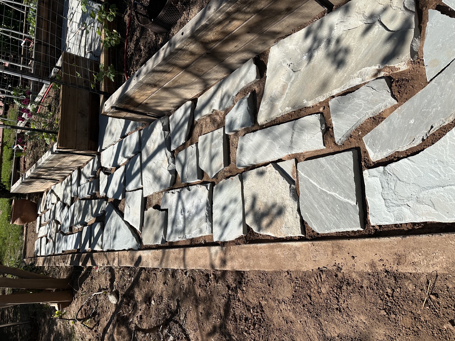 Stone retaining wall construction