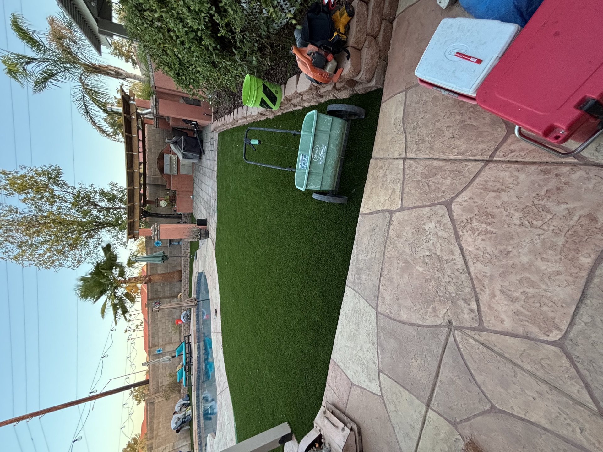 Turf cleaning and sanitization for a backyard patio