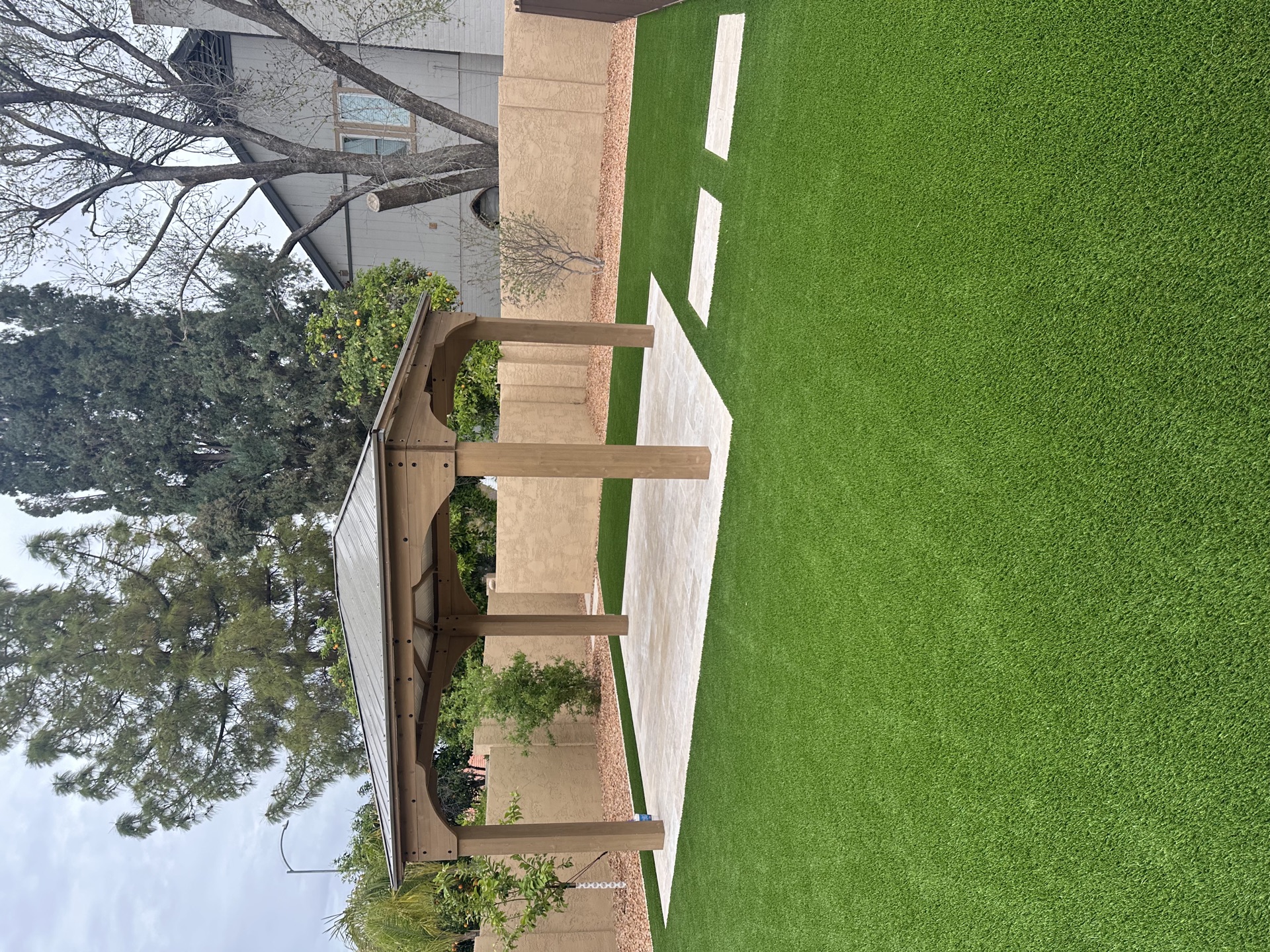 New artificial turf installation in a Mesa backyard