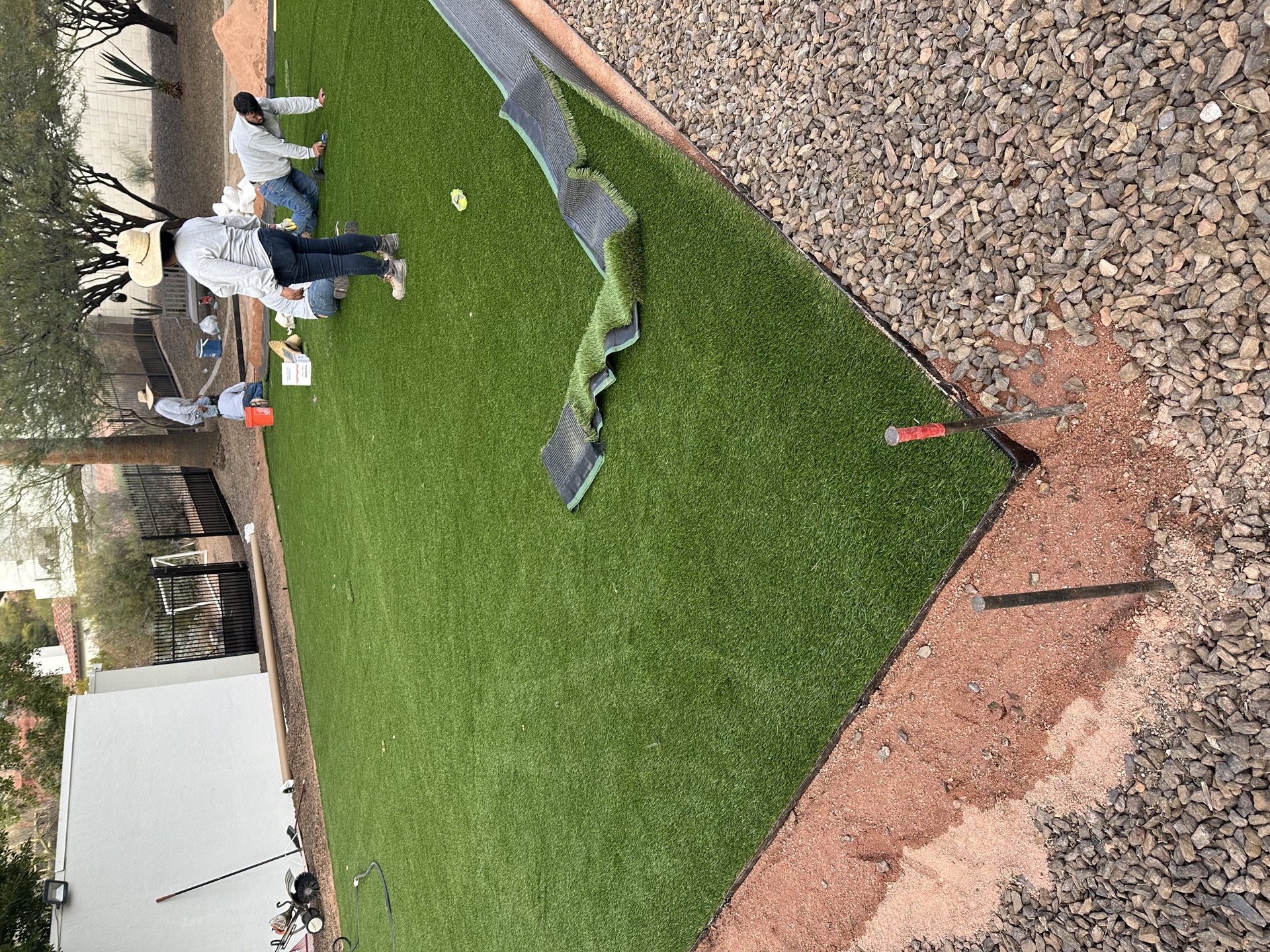 Paver patio and turf installation in a Chandler backyard