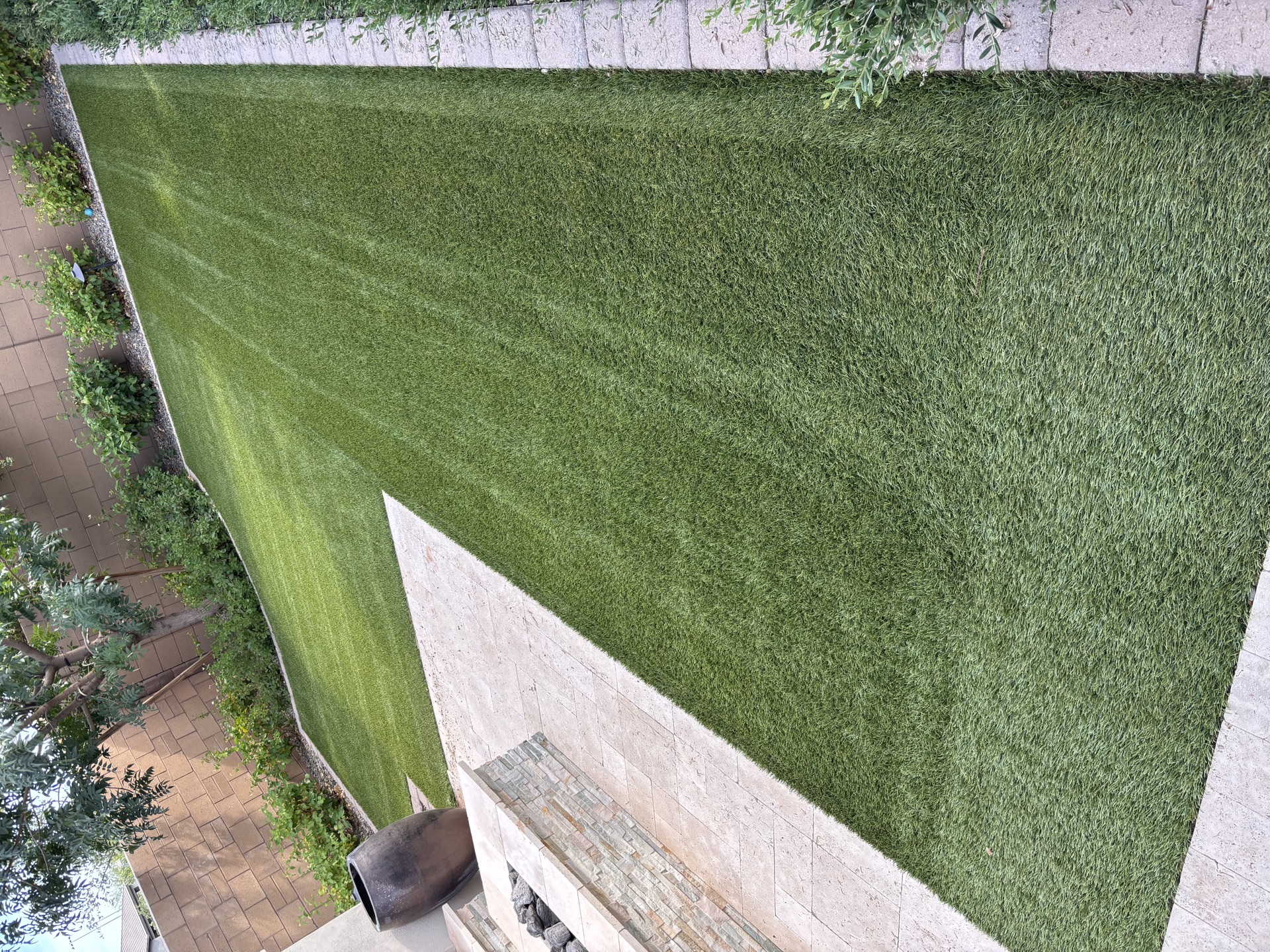 Large turf area with stone border edging