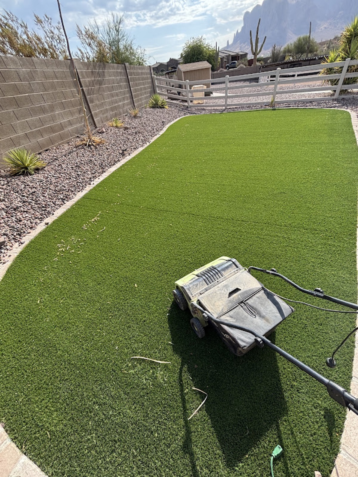 Turf cleaning with mountain backdrop