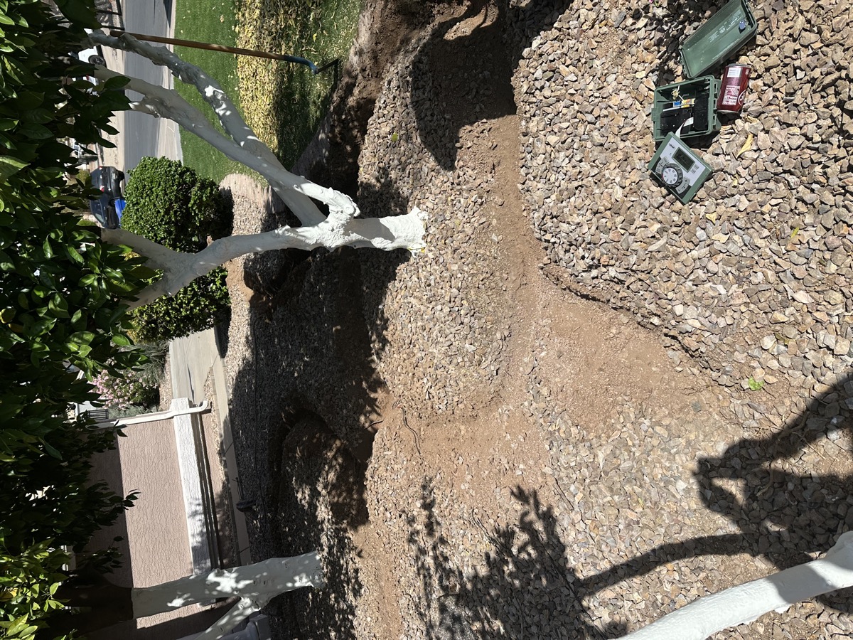Before and after synthetic grass cleaning showing infill restoration in Gilbert AZ