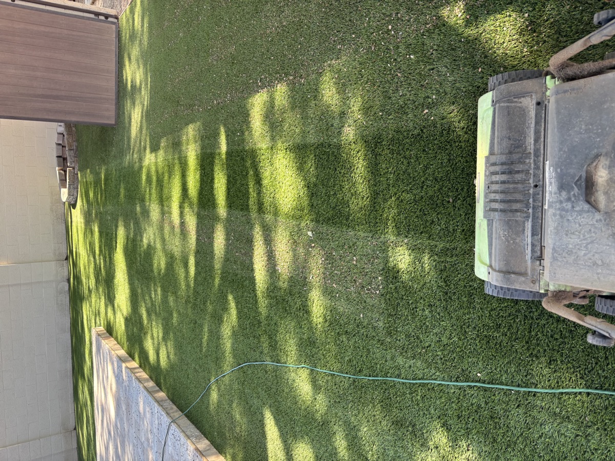 AZ Turf Cleaning truck and equipment set up for a turf sanitizing job in Mesa Arizona